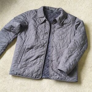 GUC Patagonia grey quilted jacket with faux fur lining.